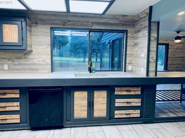 view of side of property featuring a wooden deck and french doors