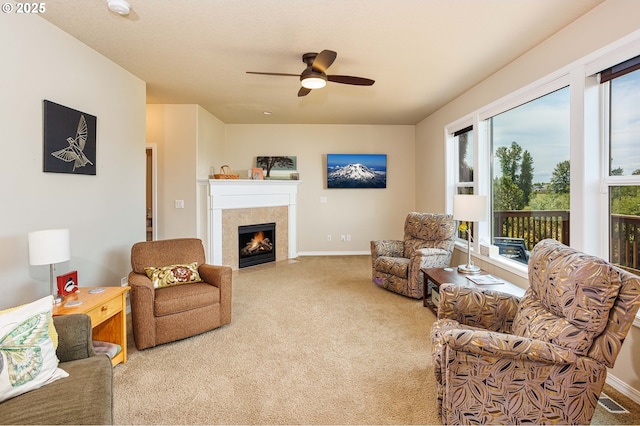 1761 S 18th Cir, Ridgefield, WA 98642 - carpeted living area with a tile fireplace and ceiling fan