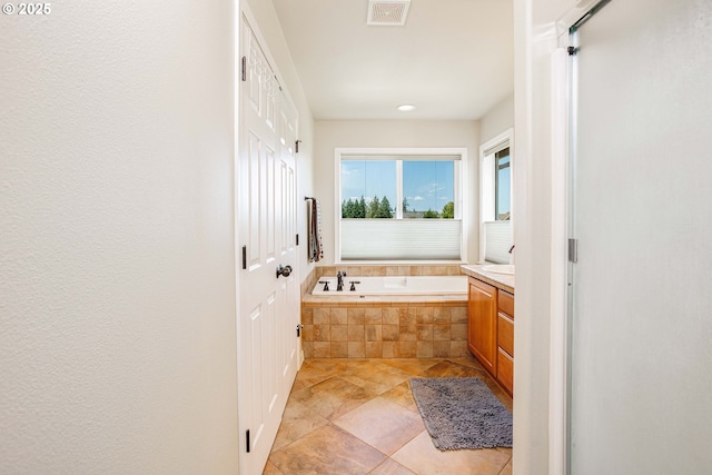 1761 S 18th Cir, Ridgefield, WA 98642 - bathroom featuring a bath, vanity, and tile patterned flooring