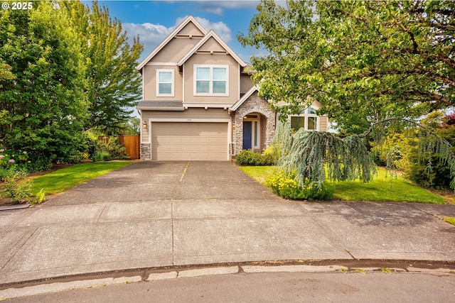 1761 S 18th Cir, Ridgefield, WA 98642 - traditional-style house featuring stone siding, an attached garage, concrete driveway, and stucco siding