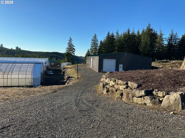 view of outbuilding with a garage