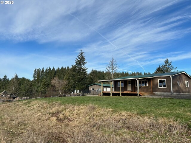 view of yard with a deck