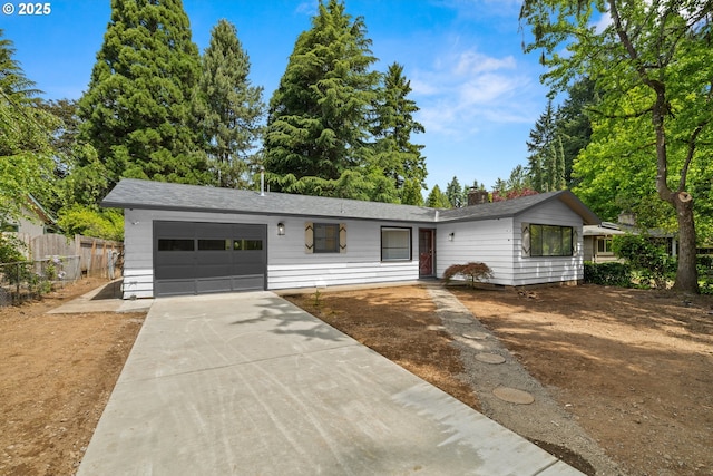 6401 Mcewan Rd, Lake Oswego, OR 97035 - view of front of property with a garage, driveway, and a chimney