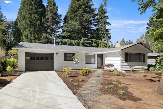 6401 Mcewan Rd, Lake Oswego, OR 97035 - ranch-style home with a garage, concrete driveway, a chimney, and a shingled roof