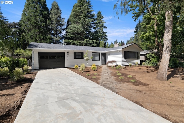 6401 Mcewan Rd, Lake Oswego, OR 97035 - ranch-style home featuring an attached garage, driveway, and a chimney