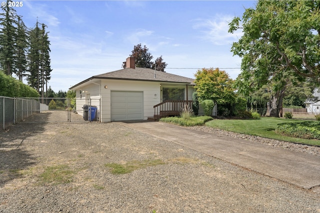 15182 Henrici Rd, Oregon City, OR 97045 - view of front of property with concrete driveway, a chimney, and a gate