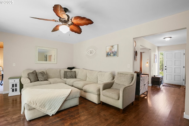 4247 Redwood Hwy, Grants Pass, OR 97527 - living room with ceiling fan, dark wood-style floors, and baseboards