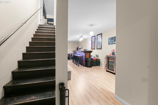 4247 Redwood Hwy, Grants Pass, OR 97527 - staircase with wood finished floors and baseboards