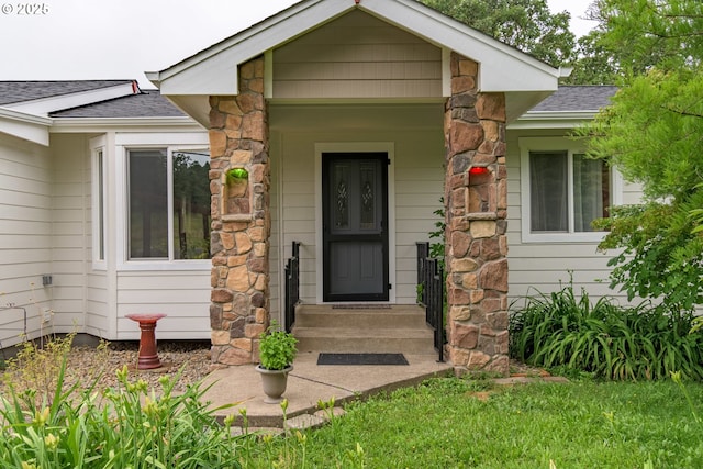 86336 N Modesto Dr, Eugene, OR 97402 - property entrance featuring a shingled roof and stone siding