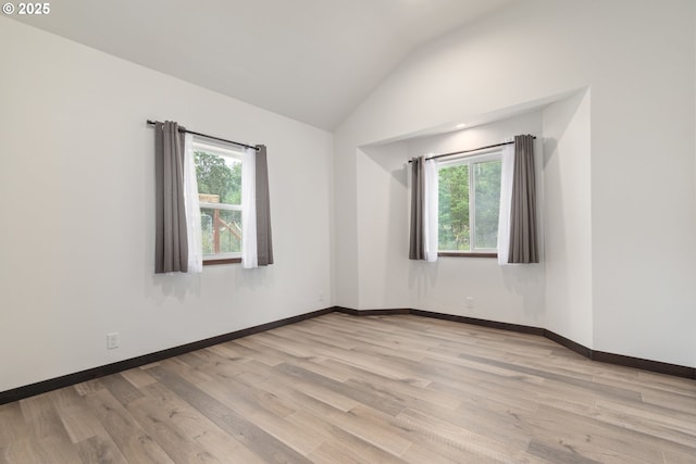 86336 N Modesto Dr, Eugene, OR 97402 - empty room featuring lofted ceiling and wood finished floors