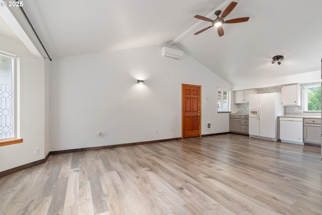 86336 N Modesto Dr, Eugene, OR 97402 - unfurnished living room with a ceiling fan, light wood-type flooring, and a wall unit AC