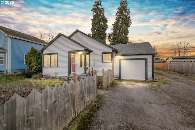 ranch-style house featuring a garage