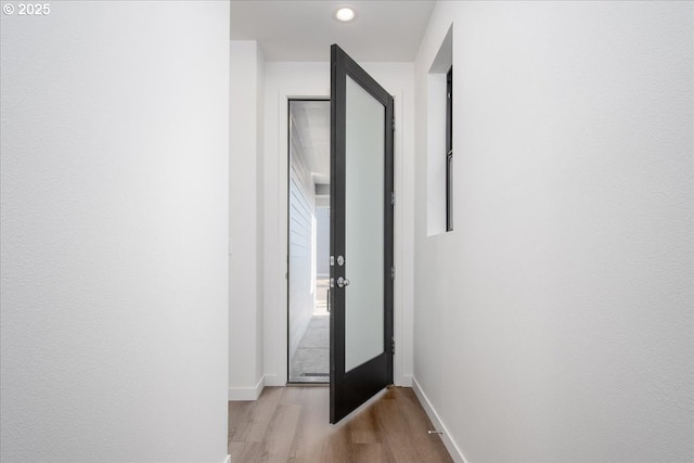 interior space with light hardwood / wood-style flooring