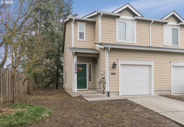 view of front of property with a garage