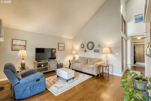2251 SW Trachsel Dr, Beaverton, OR 97003 - living area with high vaulted ceiling, wood finished floors, and baseboards