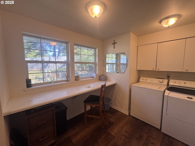 laundry area with cabinet space, dark wood-style flooring, baseboards, and washer and dryer