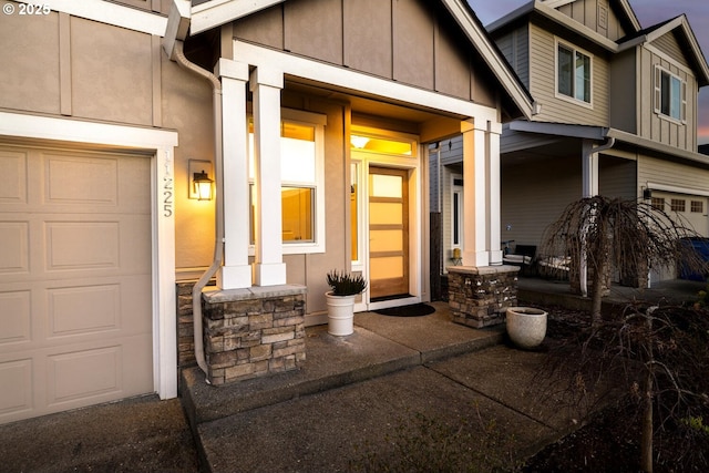 entrance to property with a porch and board and batten siding