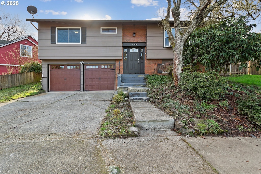 split foyer home featuring a garage