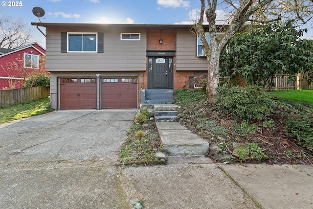 split foyer home featuring a garage