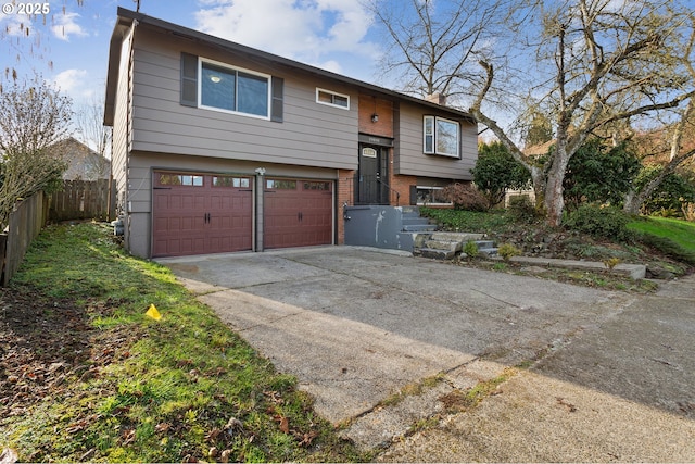 bi-level home featuring a garage