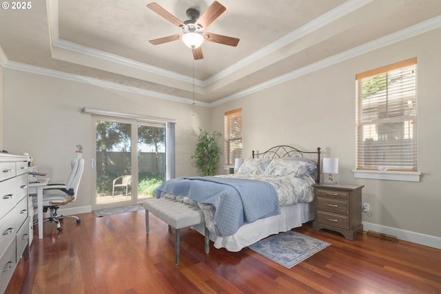 2610 Crowther Dr, Eugene, OR 97404 - bedroom with multiple windows, a desk, a raised ceiling, dark wood-style floors, and ornamental molding