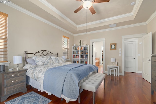 2610 Crowther Dr, Eugene, OR 97404 - bedroom with a tray ceiling, dark wood-type flooring, ornamental molding, baseboards, and ceiling fan