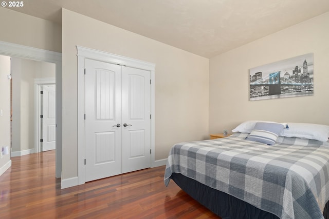 2610 Crowther Dr, Eugene, OR 97404 - bedroom featuring wood finished floors, baseboards, and a closet