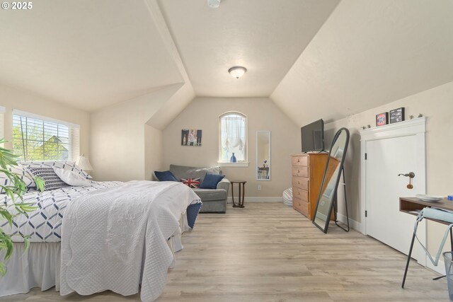 2610 Crowther Dr, Eugene, OR 97404 - bedroom with multiple windows, light wood-style floors, lofted ceiling, and baseboards