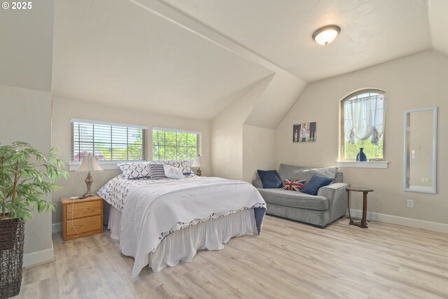 2610 Crowther Dr, Eugene, OR 97404 - bedroom with vaulted ceiling, multiple windows, wood finished floors, and baseboards