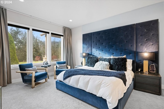 carpeted bedroom featuring recessed lighting and baseboards