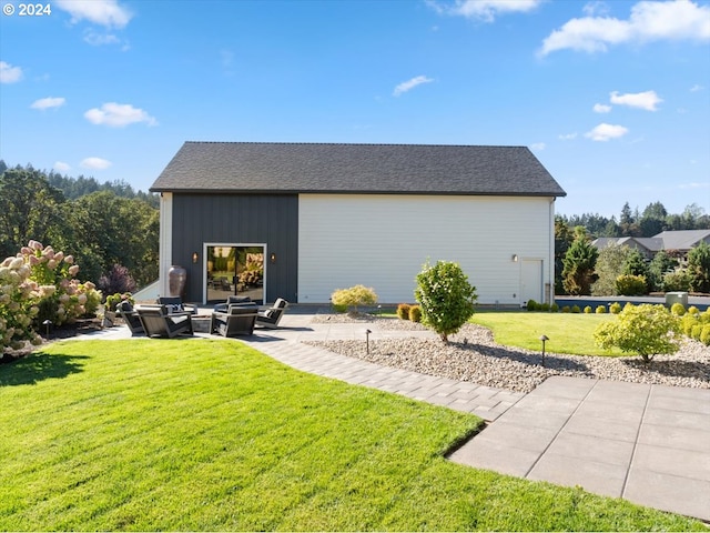 exterior space featuring a lawn, outdoor lounge area, and a patio area