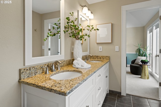 5153 Greensborough Ct, Lake Oswego, OR 97035 - bathroom with double vanity, tile patterned flooring, healthy amount of natural light, and baseboards