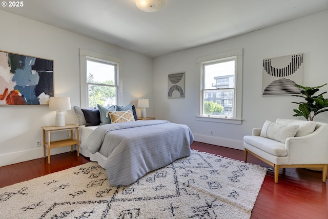 229 N Shaver St, Portland, OR 97227 - bedroom featuring multiple windows and hardwood / wood-style floors