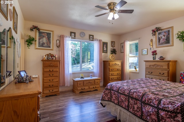 1260 Ireland Rd, Winston, OR 97496 - bedroom featuring wood finished floors and ceiling fan