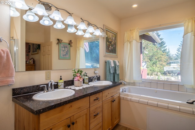 1260 Ireland Rd, Winston, OR 97496 - bathroom featuring double vanity, a sink, and a garden tub