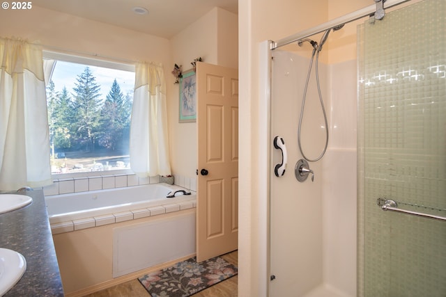 1260 Ireland Rd, Winston, OR 97496 - bathroom featuring a shower stall, a wealth of natural light, and a garden tub