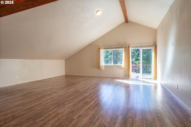 1260 Ireland Rd, Winston, OR 97496 - additional living space featuring vaulted ceiling with beams, baseboards, and dark wood-style flooring