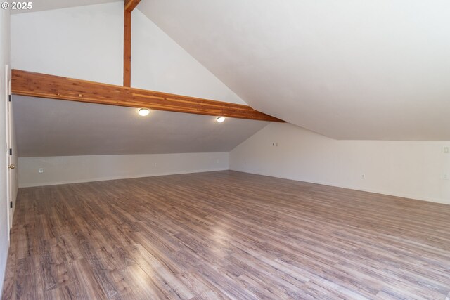 1260 Ireland Rd, Winston, OR 97496 - additional living space with lofted ceiling with beams and wood finished floors