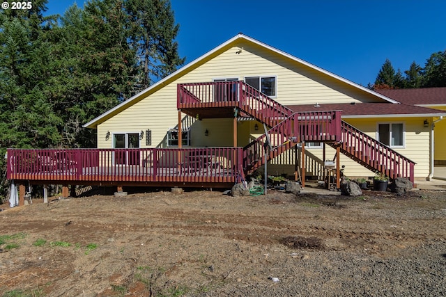 1260 Ireland Rd, Winston, OR 97496 - view of front of house featuring stairway and a wooden deck