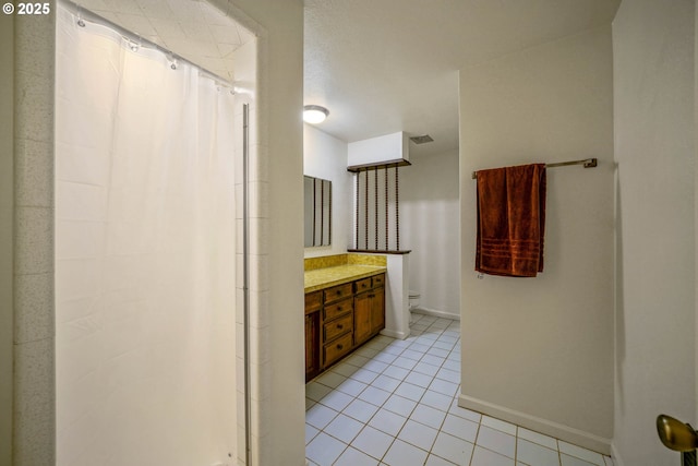 3457 Champlain Ct, Salem, OR 97304 - full bathroom featuring toilet, vanity, curtained shower, tile patterned floors, and baseboards