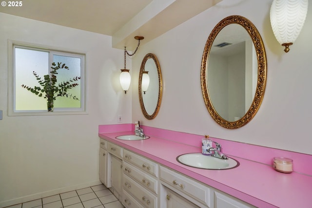 3457 Champlain Ct, Salem, OR 97304 - bathroom with tile patterned floors, double vanity, visible vents, and a sink