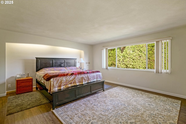 3457 Champlain Ct, Salem, OR 97304 - bedroom featuring baseboards and wood finished floors
