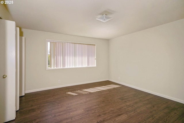 3457 Champlain Ct, Salem, OR 97304 - unfurnished bedroom featuring dark wood-style flooring and baseboards