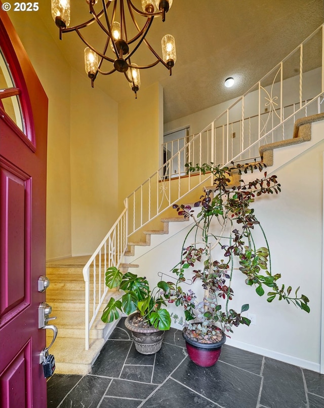 3457 Champlain Ct, Salem, OR 97304 - foyer entrance featuring a notable chandelier and stairway