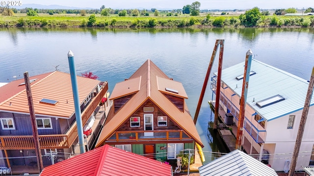 dock featuring a water view and central AC