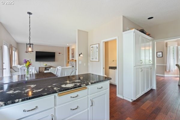 15395 SW Emerald St, Beaverton, OR 97007 - kitchen featuring dark wood-style floors, open floor plan, plenty of natural light, and white cabinetry