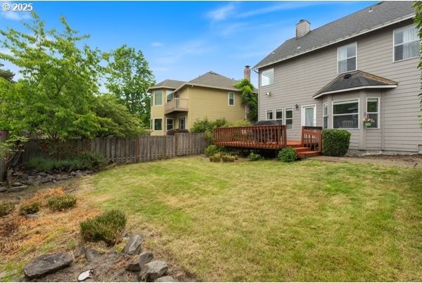 15395 SW Emerald St, Beaverton, OR 97007 - rear view of property with a deck and a chimney
