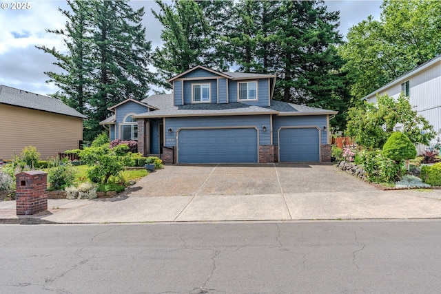 428 SE 11th Cir, Troutdale, OR 97060 - view of front facade featuring brick siding, a garage, and driveway