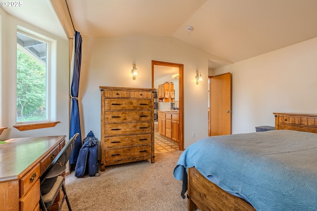 428 SE 11th Cir, Troutdale, OR 97060 - bedroom featuring light colored carpet, vaulted ceiling, and connected bathroom