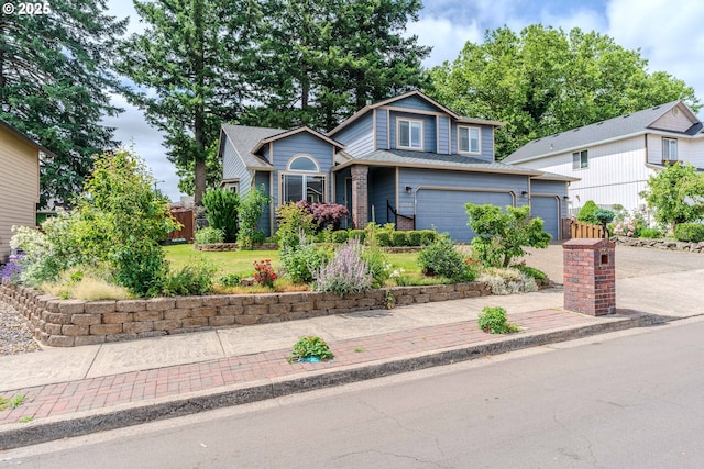 428 SE 11th Cir, Troutdale, OR 97060 - view of front of house with driveway and an attached garage